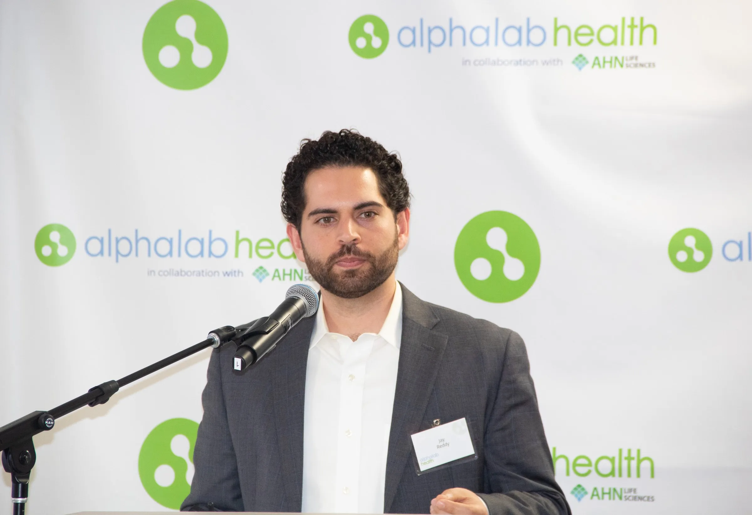 Jay Reddy presenting Advanced Optronics at the AlphaLab Health showcase.