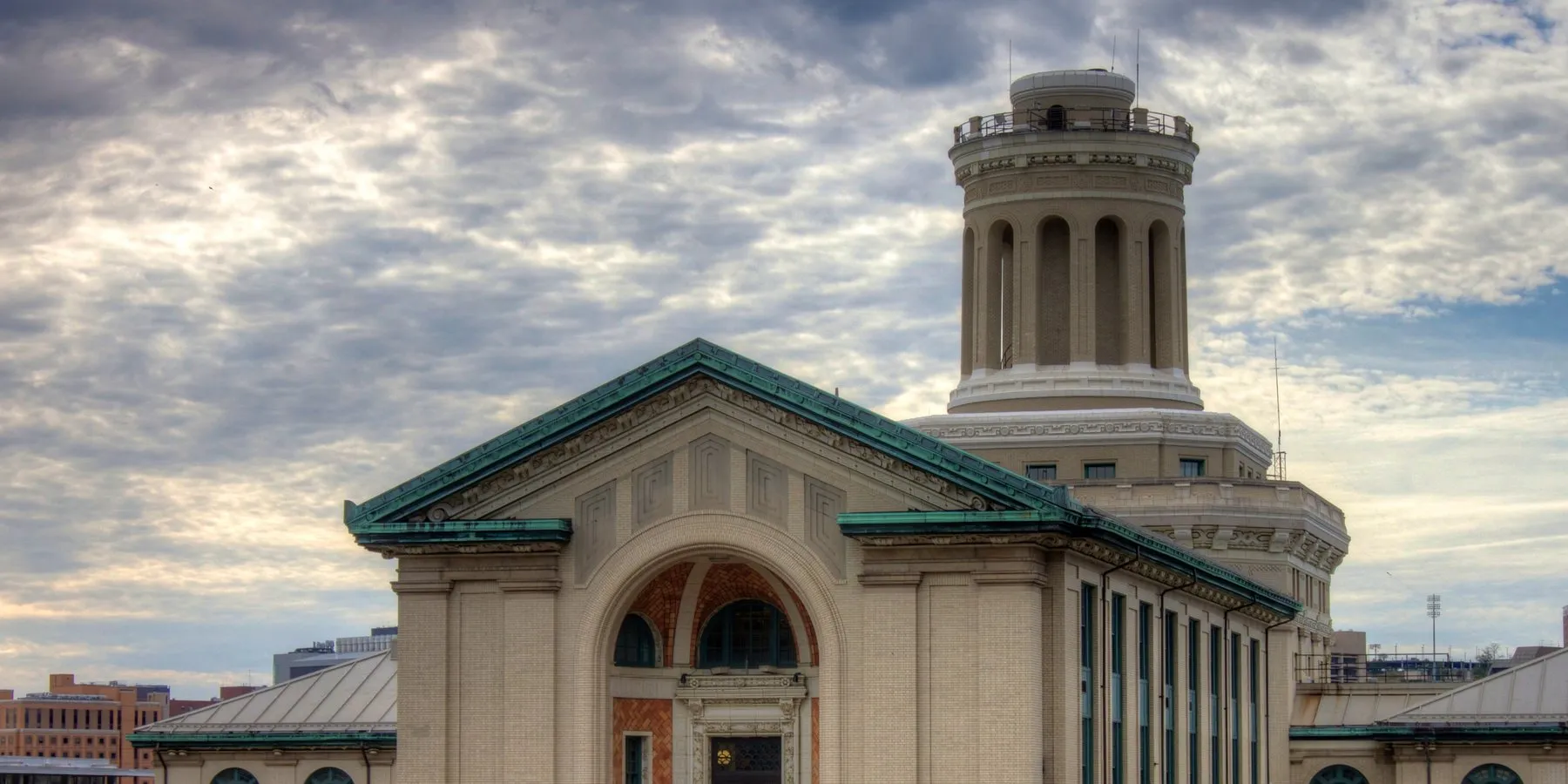 Hamerschlag Hall at Carnegie Mellon (Jiuguang Wang, CC BY-SA 2.0): the College of Engineering's domed tower above the building's own arched entrance.